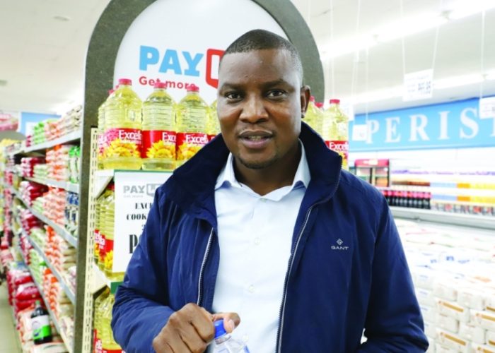 Elliot Moshoke in a Payless store